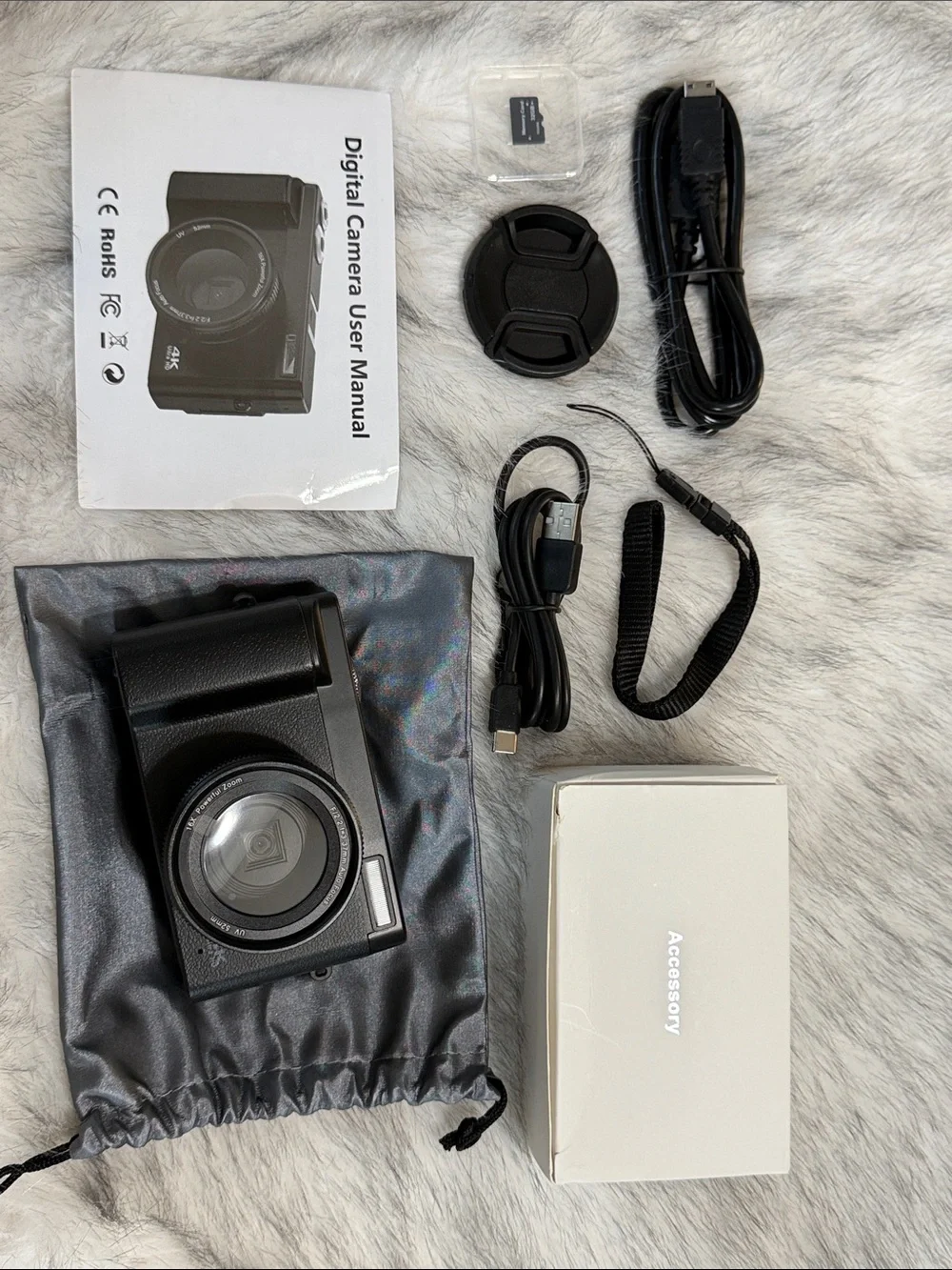 Compact Black Digital Camera with Accessories